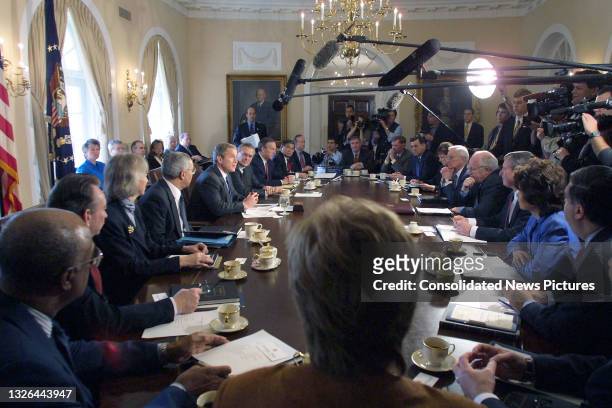 President George W Bush meets with his cabinet meeting at the White House, Washington DC, April 9, 2001. Pictured are, clockwise, from lower left,...