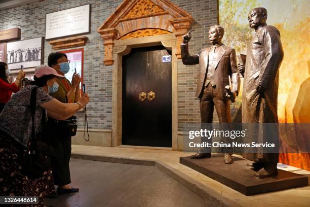 People visit the memorial of the first National Congress of the Communist Party of China on July 1, 2021 in Shanghai, China.