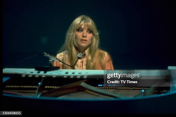 English musician and singer Lynsey De Paul playing the piano, circa 1975.