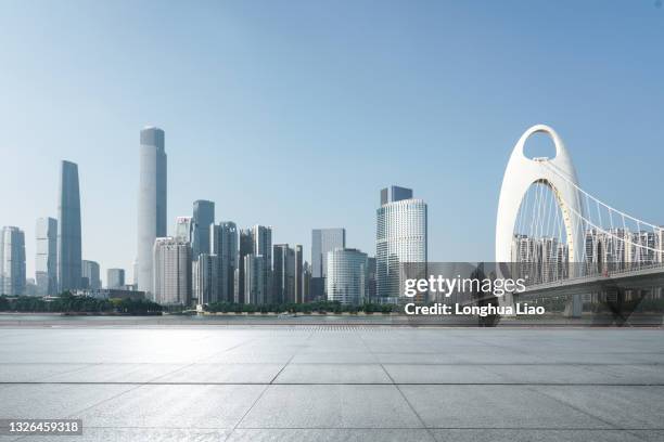 the city skyline under a clear sky - guangzhou stock pictures, royalty-free photos & images