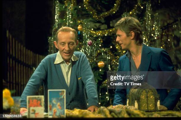 Singers Bing Crosby and David Bowie performing a medley of the songs 'Little Drummer Boy' and 'Peace On Earth' on the set of the television special...