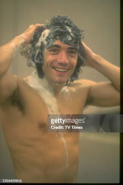 Professional footballer Kevin Keegan in the showers after a Liverpool versus Everton match, circa 1975.