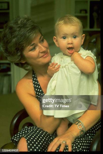 Actress Stephanie Beacham photographed with her infant daughter, circa 1975.