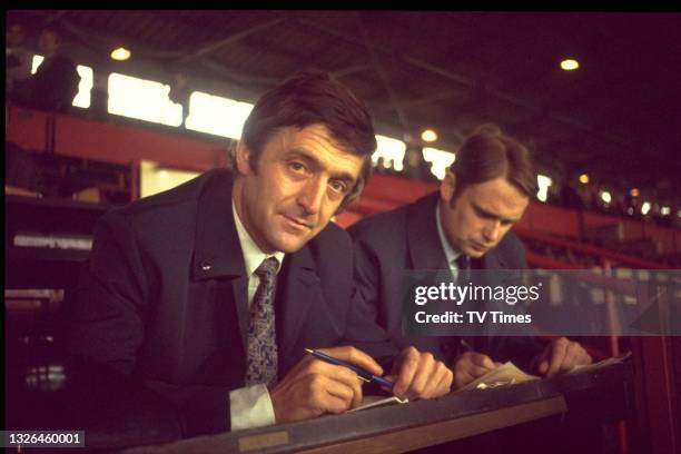 Television presenter Michael Parkinson at Old Trafford football stadium in Manchester, circa 1970. .