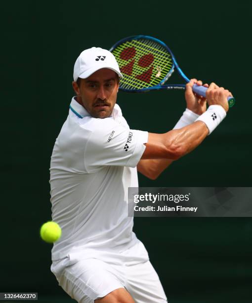 Steve Johnson of USA plays a backhand during his men's singles second round match against Taylor Fritz of USA during Day Four of The Championships -...