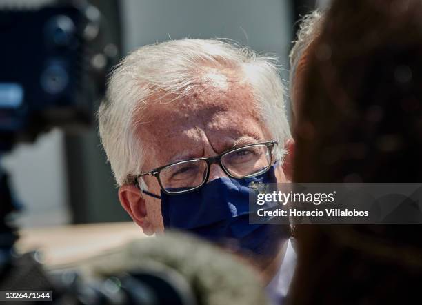 The Portuguese Minister of Internal Administration Eduardo Cabrita wears his protective mask while listening to Portuguese President Marcelo Rebelo...