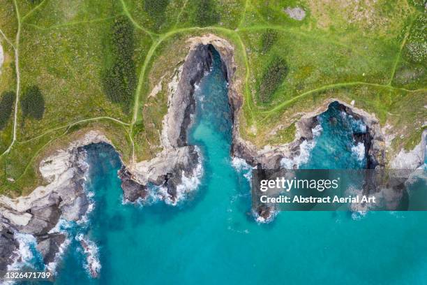 drone shot looking down on a section of the cornish coastline, united kingdom - coastline bildbanksfoton och bilder