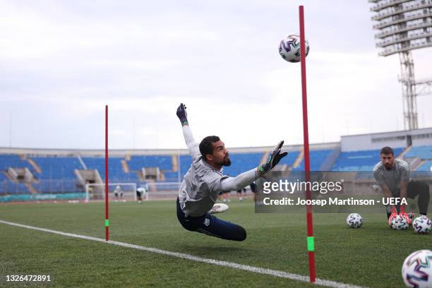 Robert Sanchez of Spain makes a save during the Spain Training Session ahead of the UEFA Euro 2020 Quarter Final match between Spain and Switzerland...