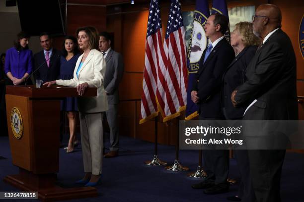 Speaker of the House Rep. Nancy Pelosi speaks as Rep. Elaine Luria , Rep. Pete Aguilar , Rep. Stephanie Murphy , Rep. Jamie Raskin , Rep. Adam Schiff...