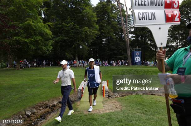 Rory McIlroy of Northern Ireland walks with his caddie Harry Diamond during Day One of The Dubai Duty Free Irish Open at Mount Juliet Golf Club on...