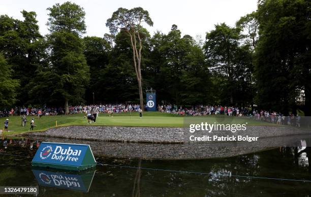 Rory McIlroy of Northern Ireland putts on the 13th hole during Day One of The Dubai Duty Free Irish Open at Mount Juliet Golf Club on July 01, 2021...