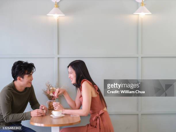 couple in cafe - couple in cafe coffee stock pictures, royalty-free photos & images
