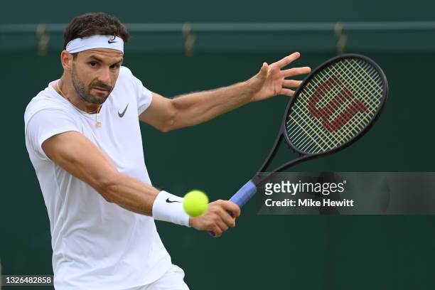 Grigor Dimitrov of Bulgaria plays a backhand during his men's singles second round match against Alexander Bublik of Kazakhstan during Day Four of...