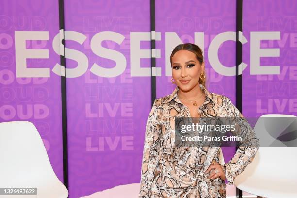 In this image released on July 1, Adrienne Bailon attends the ESSENCE Beauty Carnival during the 2021 ESSENCE Festival Of Culture presented by...