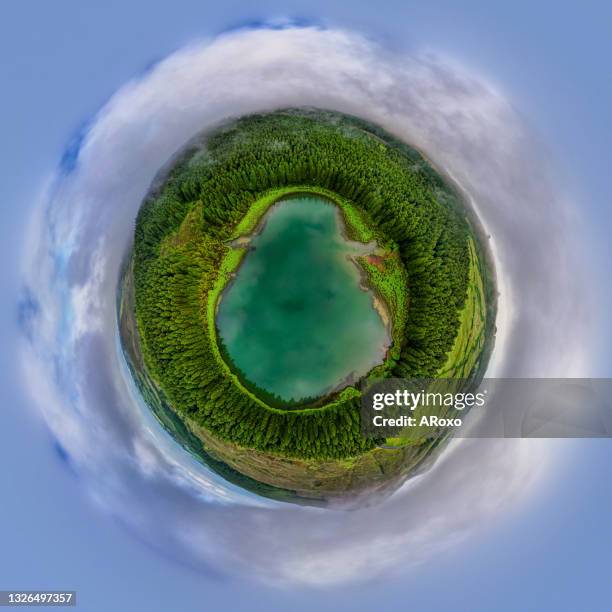 aerial view of azores, portugal. little planet panorama 360 degrees. drone landscape in a tiny planet image of the ghost shape lake with trees. travel destination. summer vacations. - 360 globe stockfoto's en -beelden