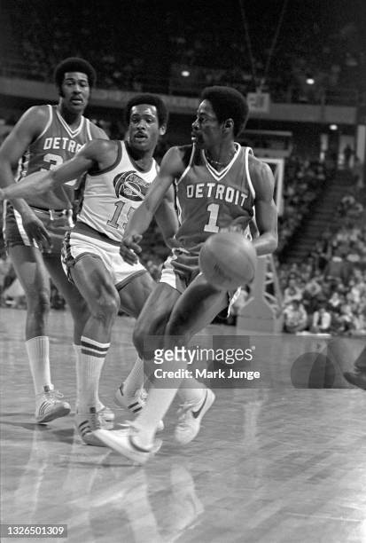 Denver Nuggets guard Jim Price tries to block Detroit Pistons guard Kevin Porter, Sr. #1 in an NBA basketball game at McNichols Arena on March 20,...