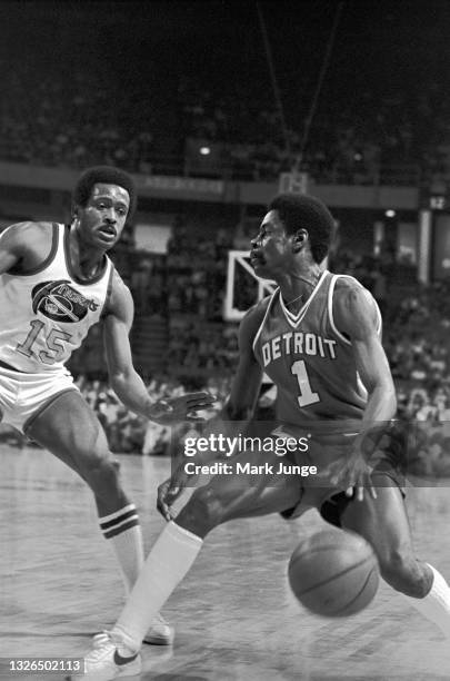 Detroit Pistons guard Kevin Porter, Sr. #1 dribbles the basketball away from Denver Nuggets defender Jim Price during an NBA basketball game at...