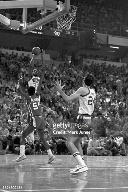 Denver Nuggets forward David Thompson shoots a jumper from the corner during an NBA basketball game against the Detroit Pistons at McNichols Arena on...