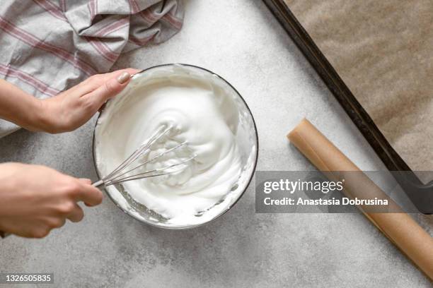 process of making french meringue. whipped eggs. - whipped food stock pictures, royalty-free photos & images