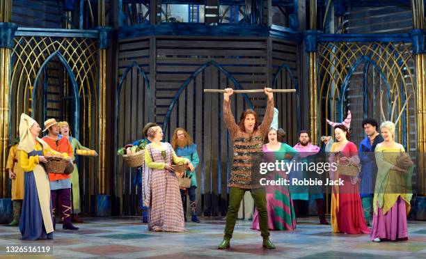 Jacques Imbrailo as Raimbaud with artists of the company in Garsington Opera's production of Gioachino Rossini's opera Le Comte Ory directed by Cal...