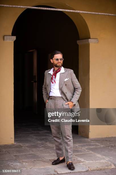 Niccolo Cesari, wearing grey suits, is seen at Fortezza Da Basso on July 01, 2021 in Florence, Italy.