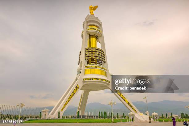ashgabat turkmenistan monument of neutrality - ashgabat stock pictures, royalty-free photos & images