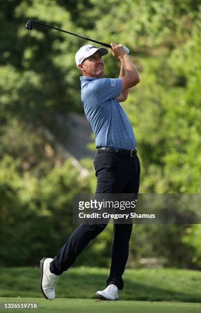 Jimmy Walker plays his shot from the ninth tee during the first round of the Rocket Mortgage Classic on July 01, 2021 at the Detroit Golf Club in...