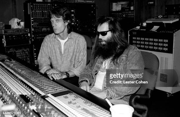 English singer, songwriter, actor, and film producer Mick Jagger sits with American record producer and founder of Def American Recordings Rick Rubin...