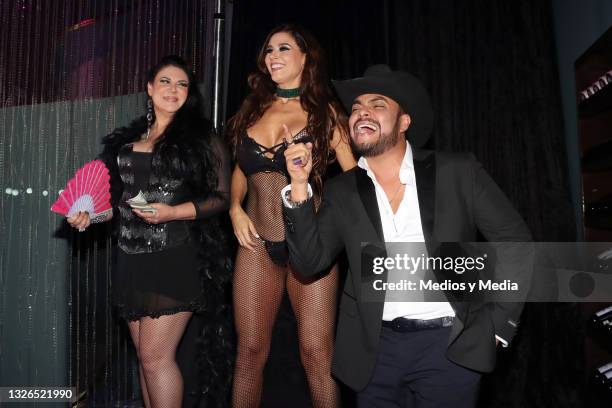 Alejandra Ávalos, Dorismar and Marko Peña attends a videoclip premiere of the new Marko Peña song called 'Chica Linda y Sexy' on July 1, 2021 in...