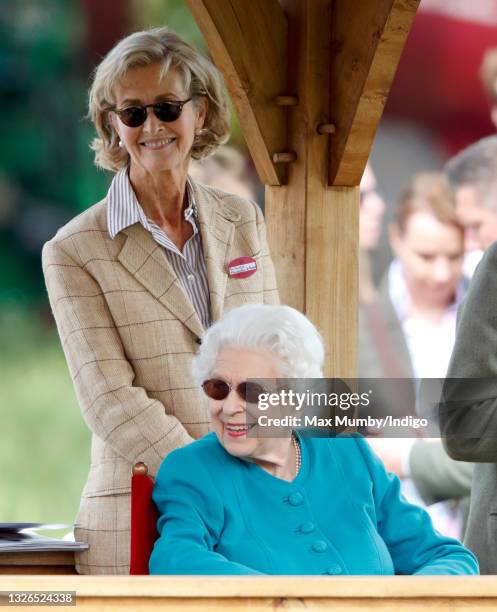 Queen Elizabeth II, accompanied by Penelope Knatchbull, Countess Mountbatten of Burma, attends day 1 of the Royal Windsor Horse Show in Home Park,...