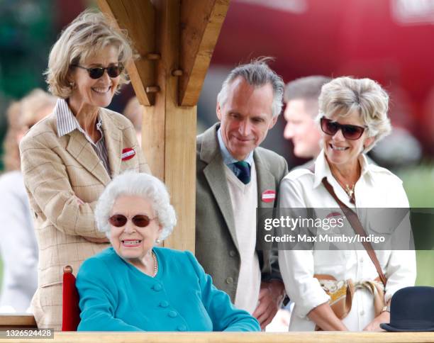 Queen Elizabeth II, accompanied by Penelope Knatchbull, Countess Mountbatten of Burma, Rupert Ponsonby, Lord de Mauley and Lucinda Ponsonby, Lady de...