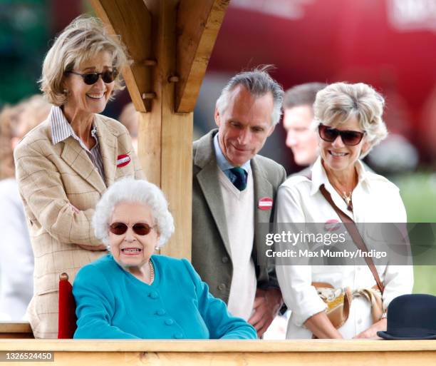 Queen Elizabeth II, accompanied by Penelope Knatchbull, Countess Mountbatten of Burma, Rupert Ponsonby, Lord de Mauley and Lucinda Ponsonby, Lady de...