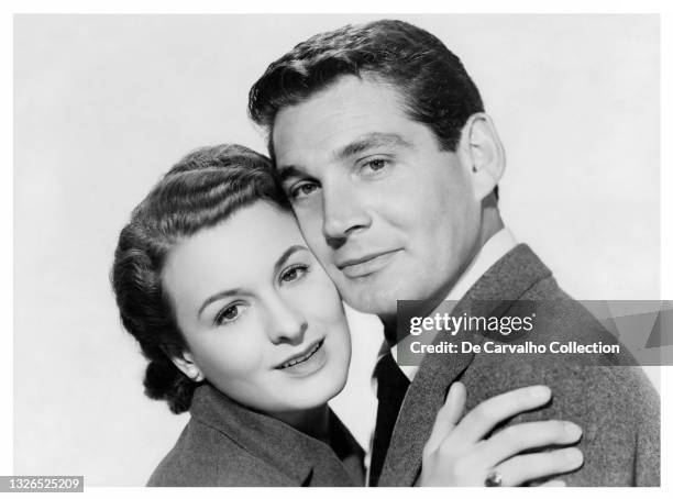 Actress Lydia Clarke in her first credited role in the cinema as 'Martha Addison' and Actor Gene Barry in his cinematic debut as 'Dr. Frank Addison'...