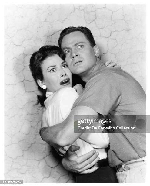 Actress Mara Corday as 'Stephanie/Steve Clayton' and Actor John Agar as 'Dr. Matt Hastings' in a publicity shot from the movie 'Tarantula' United...