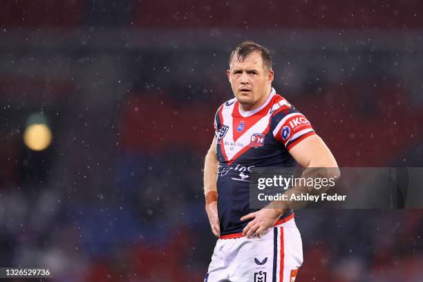 Josh Morris of the Roosters looks dejected during the round 16 NRL match between the Sydney Roosters and the Melbourne Storm at McDonald Jones...