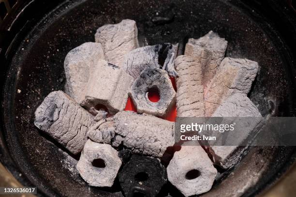 japanese hibachi style grill cuisine, shichirin and charcoal, close-up of barbecue grill - 炭火焼 ストックフォトと画像