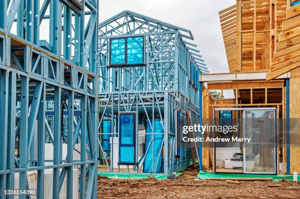 building construction site, new housing development, metal and timber frame - australia or new zealand stock-fotos und bilder