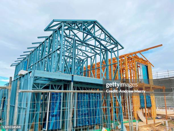 new house construction site, metal and timber frame - australia or new zealand stock-fotos und bilder