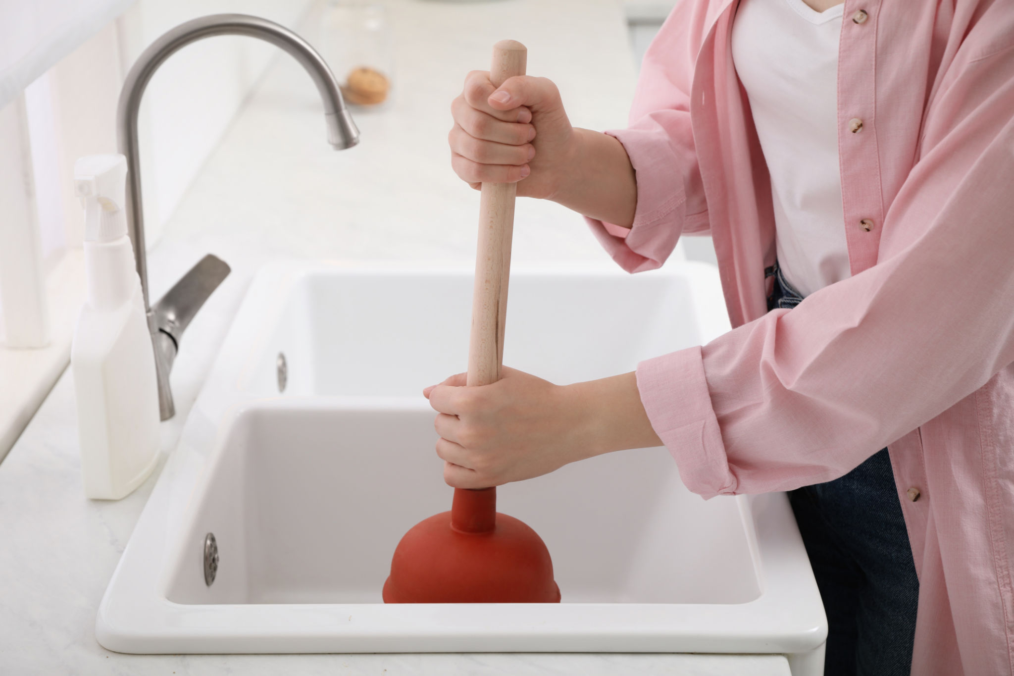 unclogging sink
