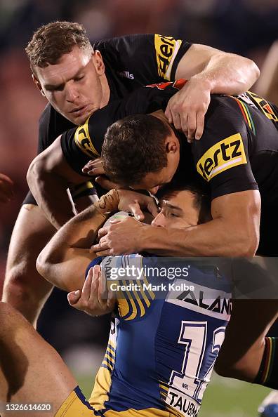 Ryan Matterson Rugby Ryan Matterson of the Eels is tackled during the round 16 NRL match ...