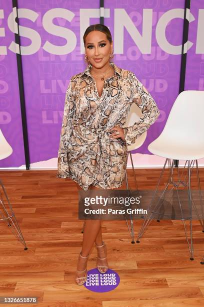 In this image released on July 2, Adrienne Bailon attends the Beauty Carnival during the 2021 ESSENCE Festival Of Culture presented by Coca-Cola in...