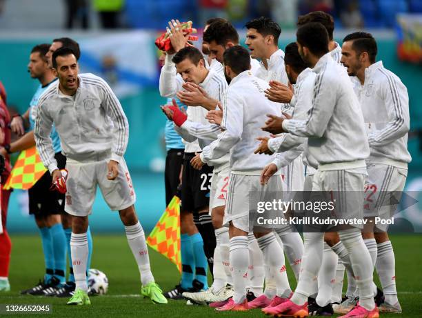 Sergio Busquets of Spain encourages the team after singing the national anthem prior to the UEFA Euro 2020 Championship Quarter-final match between...