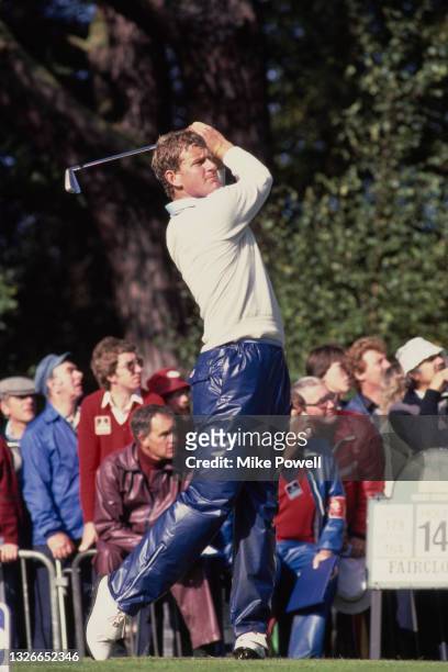 Spectators look on as Sandy Lyle of Scotland tees off on the 14th during the European Open Championship golf tournament on 5th September 1982 at...