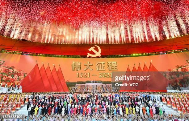Fireworks explode and dancers perform at the National Stadium during a rehearsal for an art performance titled 'The Great Journey' in celebration of...