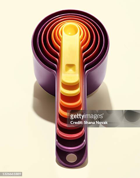 colorful measuring cups - "shana novak" stock pictures, royalty-free photos & images