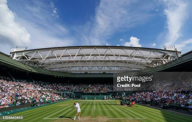 General view of centre court as Daniel Evans of Great Britain serves against Sebastian Korda of USA during their men's singles third Round match on...