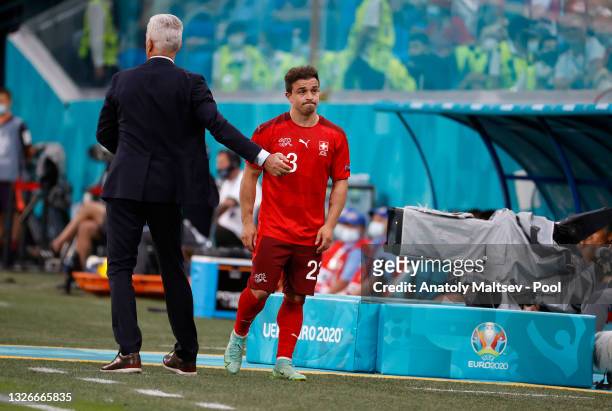 Vladimir Petkovic, Head Coach of Switzerland embraces Xherdan Shaqiri of Switzerland after being substituted during the UEFA Euro 2020 Championship...
