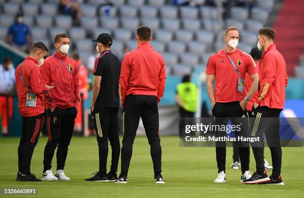 Matz Sels of Belgium inspects the pitch with team mates prior to the UEFA Euro 2020 Championship Quarter-final match between Belgium and Italy at...