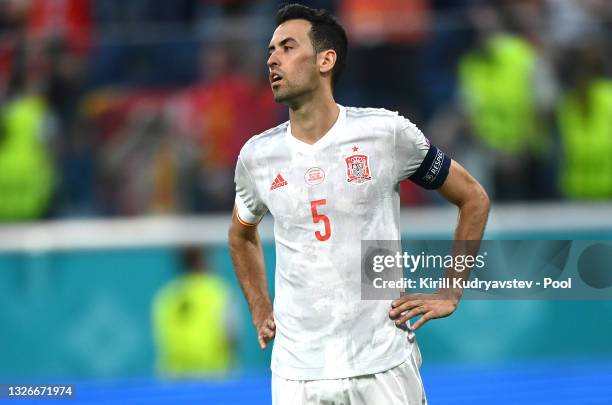 Sergio Busquets of Spain reacts after hitting the post from their side's first penalty in a penalty shoot out during the UEFA Euro 2020 Championship...