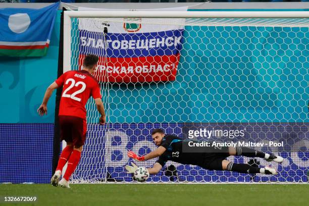 Unai Simon of Spain saves the second penalty from Fabian Schar of Switzerland in the penalty shoot out during the UEFA Euro 2020 Championship...